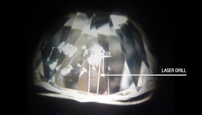 clear laser drill holes